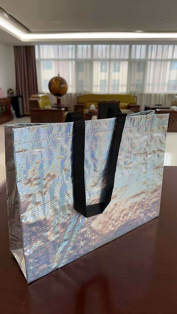 RGS PACKAGING's nye Laser Film Woven Tote Bag